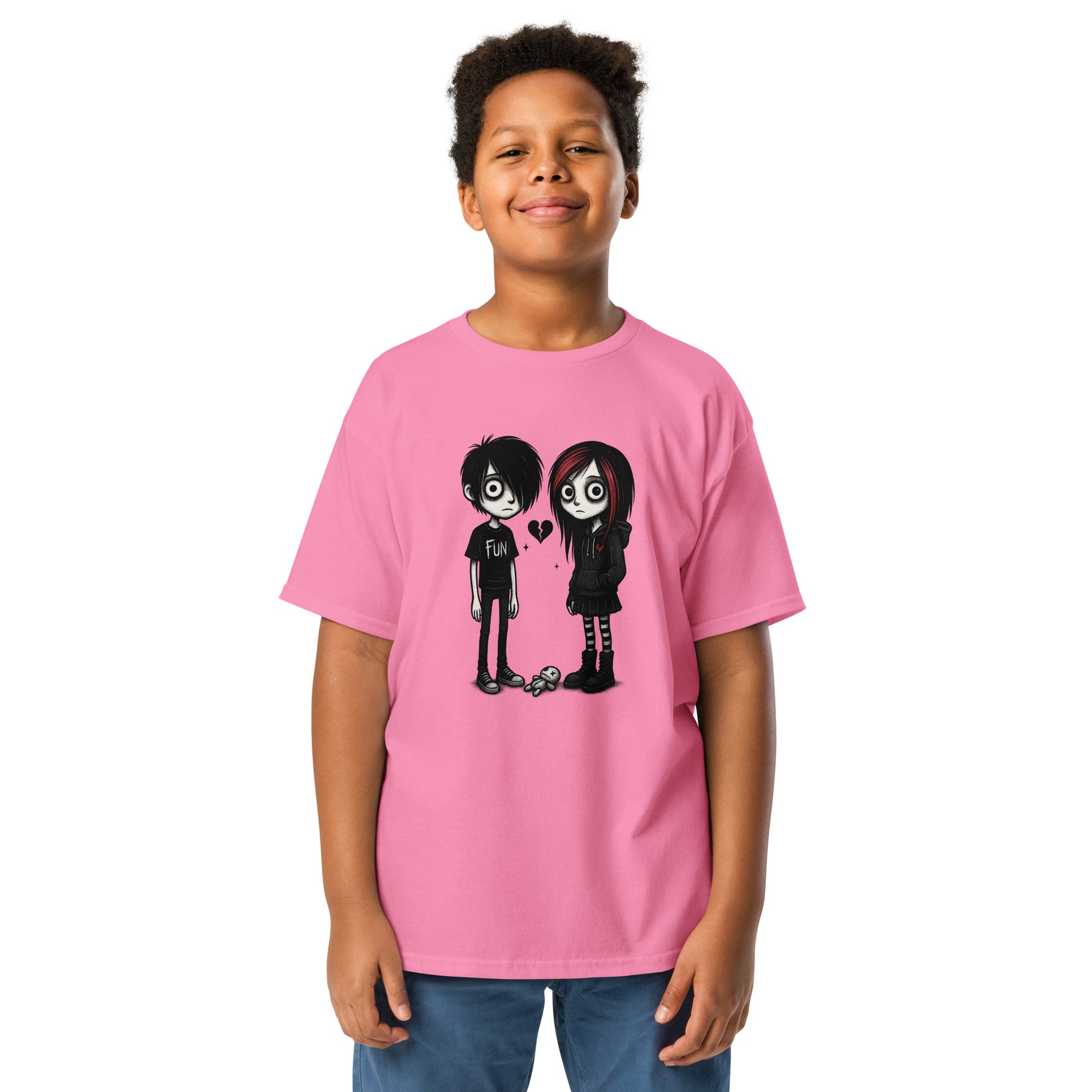 Child wearing a pink t-shirt with cartoon characters on a white background